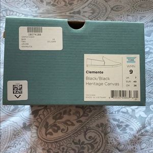 TOMS black slip on shoe